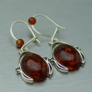 Oval Amber dangly silver earrings